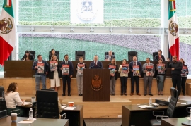 El diputado local Arturo Máximiliano durante su posicionamiento en el pleno del congreso