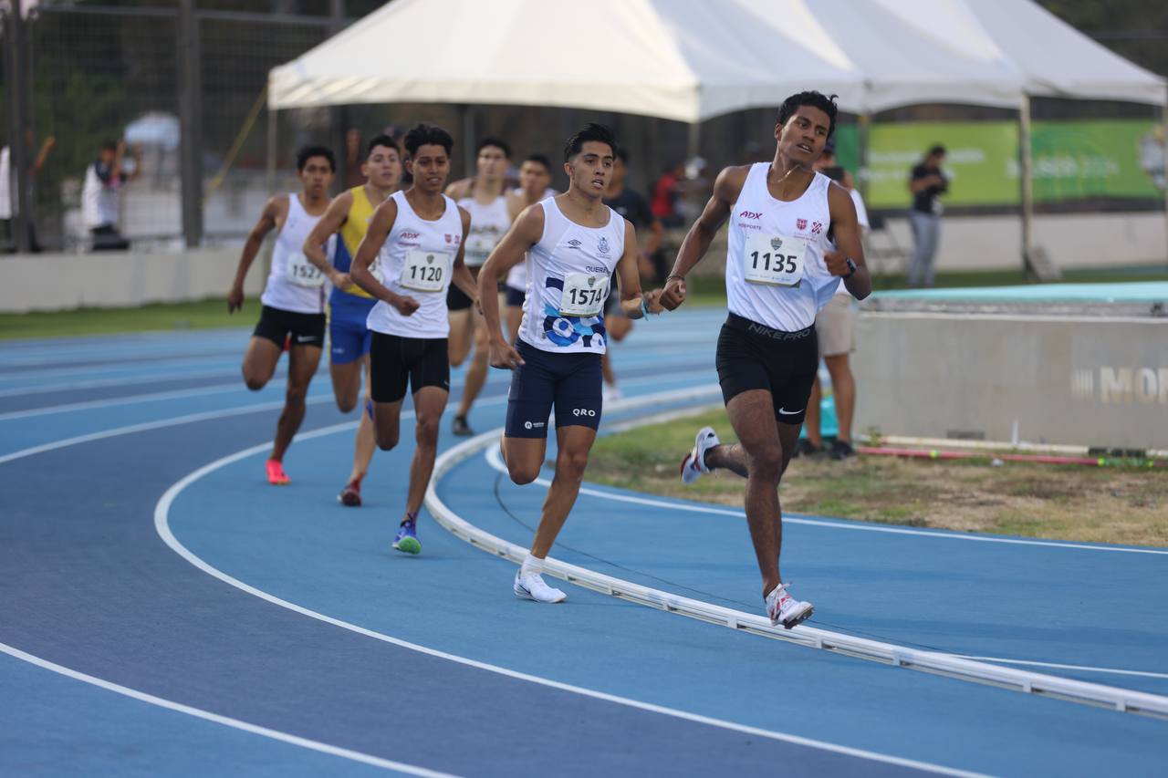 Destaca Querétaro con 28 medallas y un récord nacional en atletismo. Deportistas de alto rendimiento le dan a Querétaro 28 preseas en pruebas de pista y campo en los Nacionales CONADE. A com